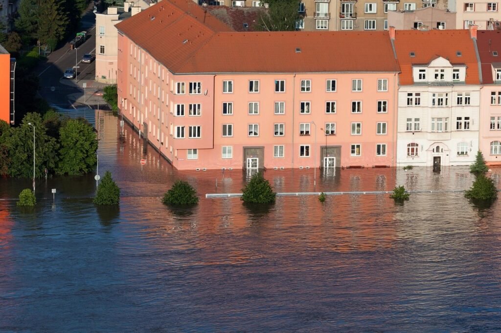 Flood Insurance Rates by Zip Code - flooded street and houses