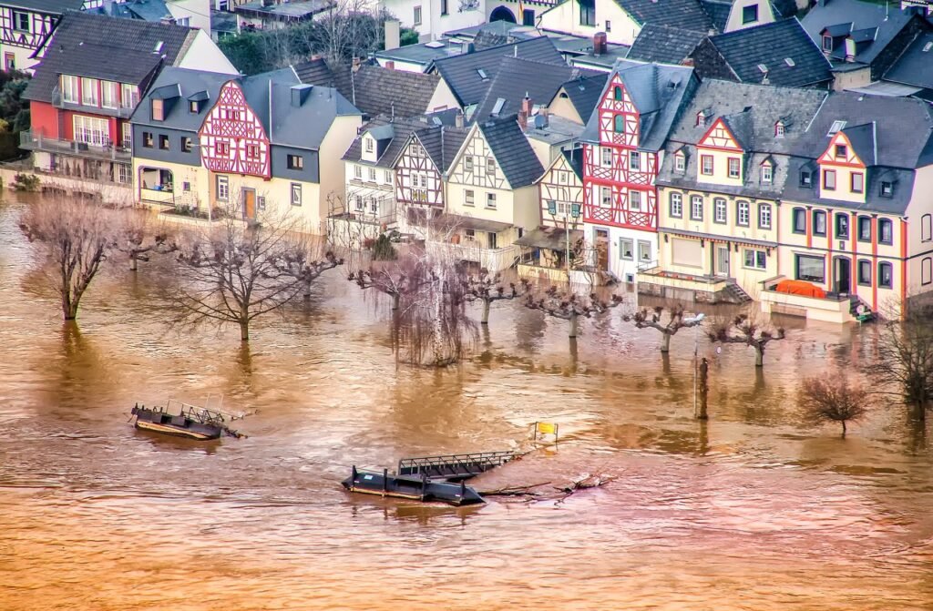Flood Insurance Rates by Zip Code - house surrounded by flood water