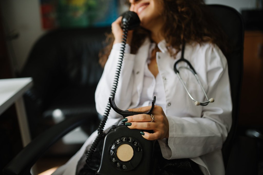 Health Insurance for Self-Employed - doctor talking with patient