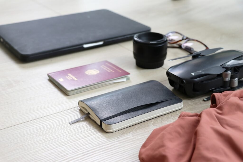 How to Choose International Travel Medical Insurance - person packing passport and map