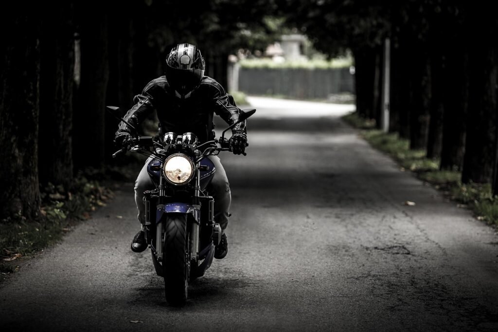 Motorcycle Insurance Cost - motorcycle rider on open road