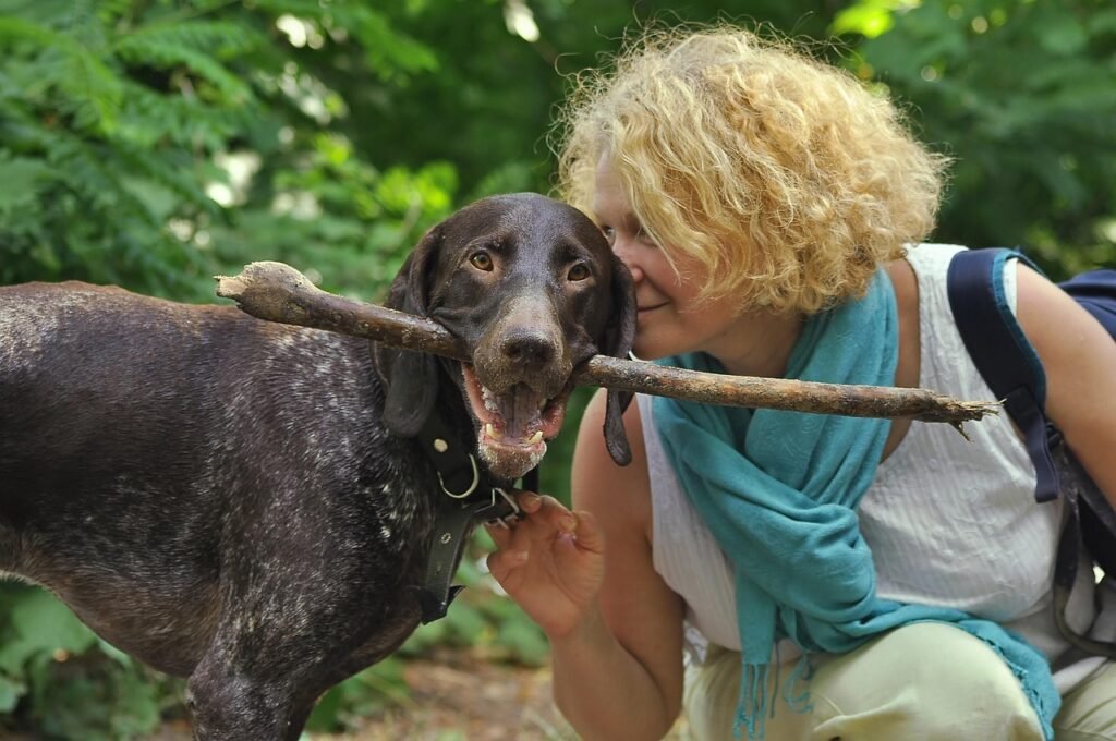 Pet Insurance for Dogs - happy dog with owner Pet Insurance for Dogs - happy dog with owner